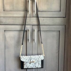 Snakeskin and black vegan leather crossbody